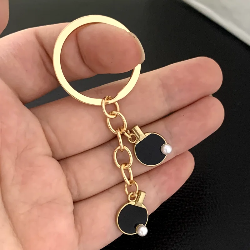 Black Red sports table tennis  - огляд і ціна Table Tennis Keychain